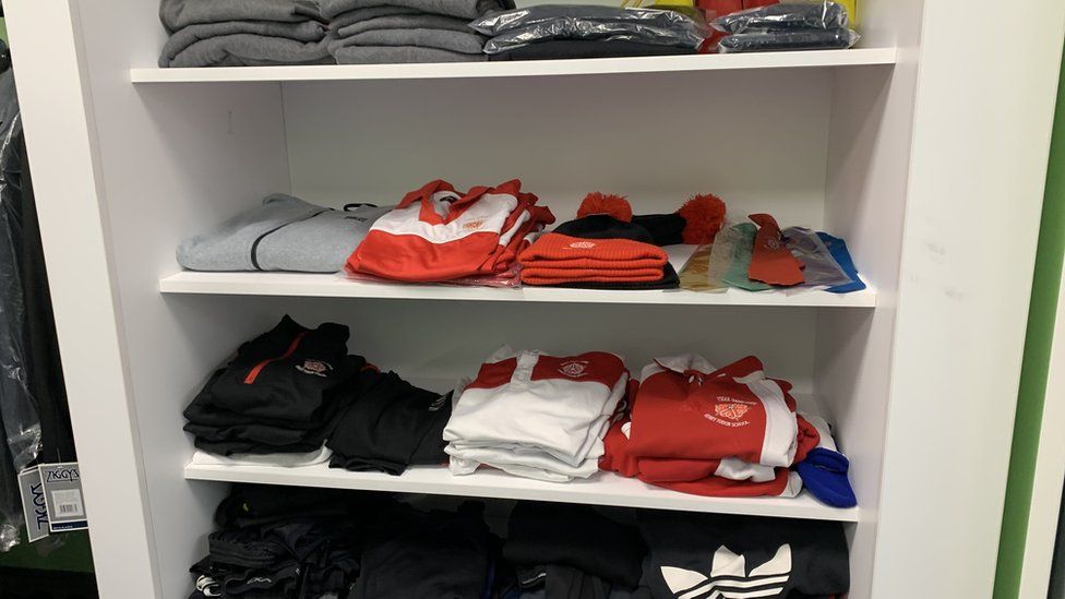 Clothing on shelves at Henry Tudor School