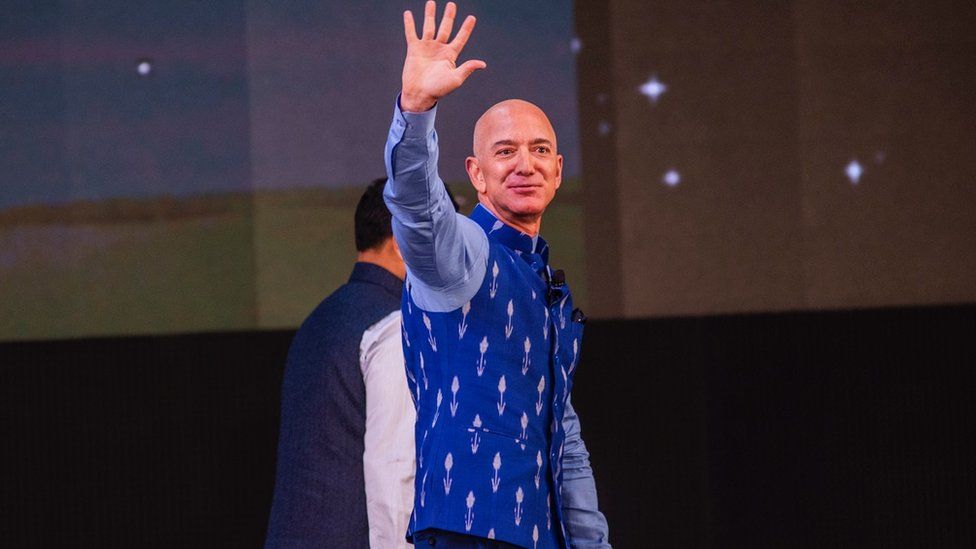 Jeff Bezos waving