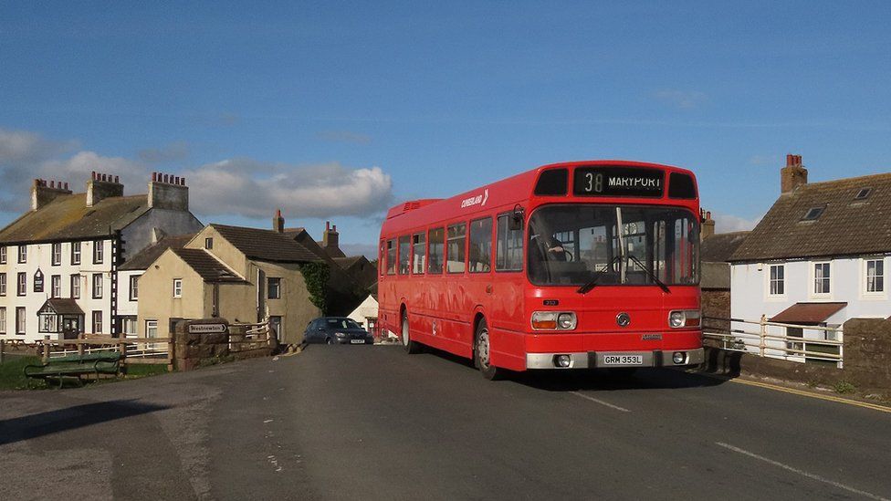 The oldest Cumberland Leyland National - 353 (GRM353L) of 1973, heading home through Allonby