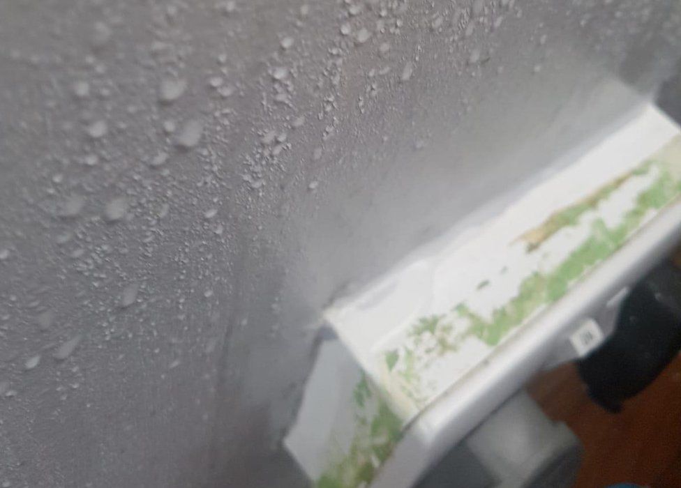 Condensation on the interior walls inside one of the flats