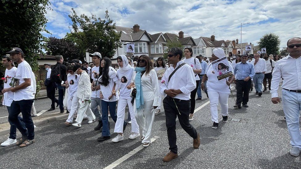 Family march at vigil