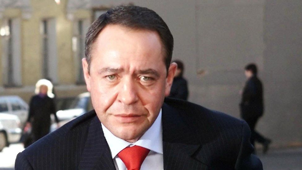 Russia"s Mass Media Minister Mikhail Lesin enters his ministry in central Moscow, in this file photo from March 27, 2002