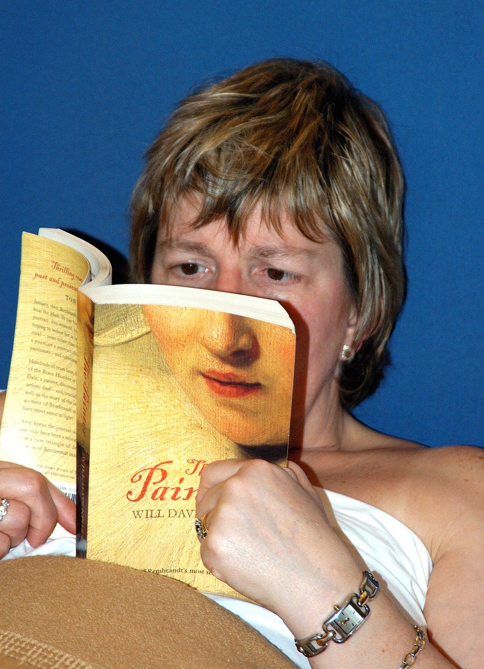 A woman reads her book