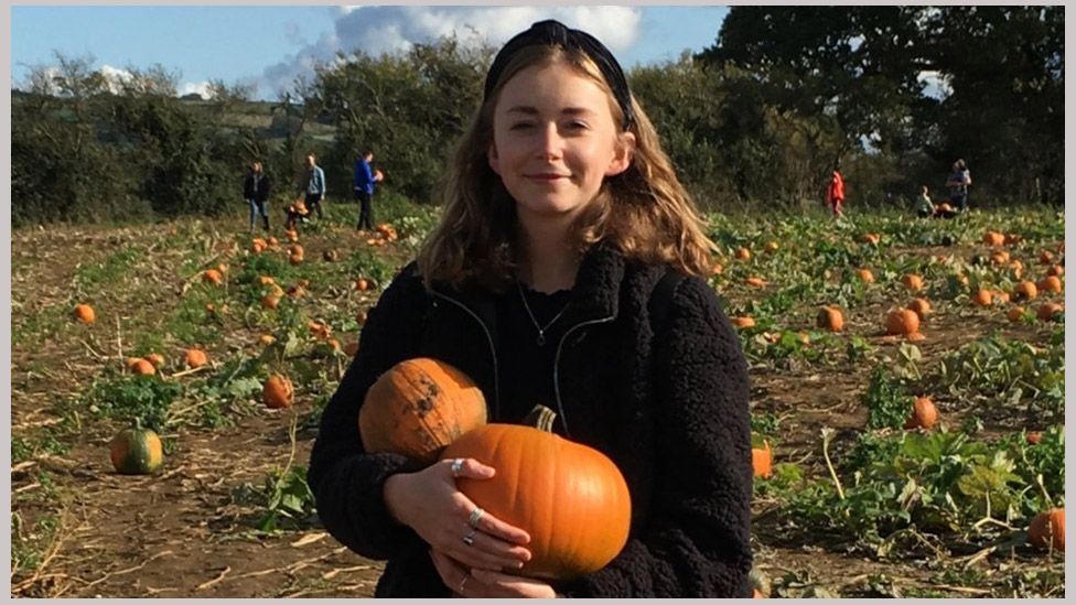 Eliza Hunt with her pumpkins