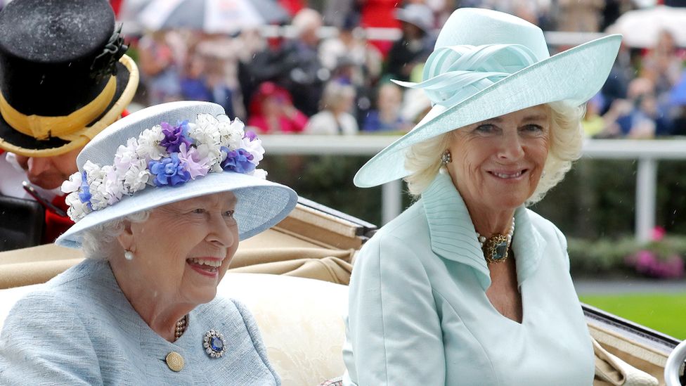 Queen Elizabeth II and Camilla, Duchess of Cornwall, arrive in a horse carriage on day two of Royal Ascot at Ascot Racecourse on June 19, 2019.