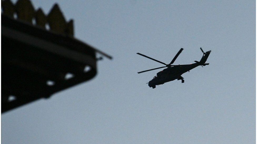 A Myanmar military helicopter in the sky