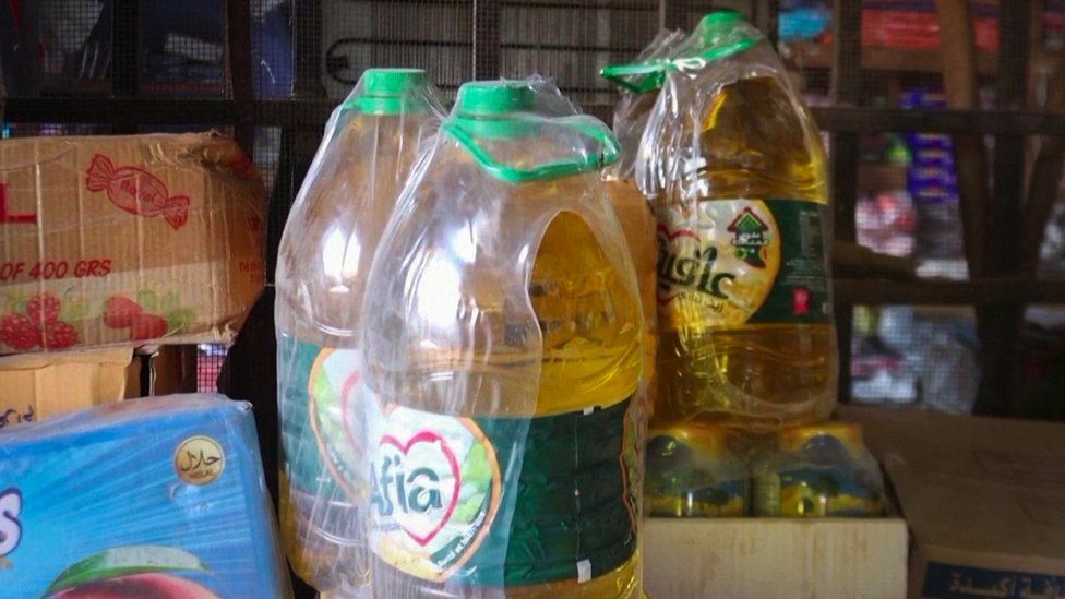 Bottles of cooking oil in a small shop