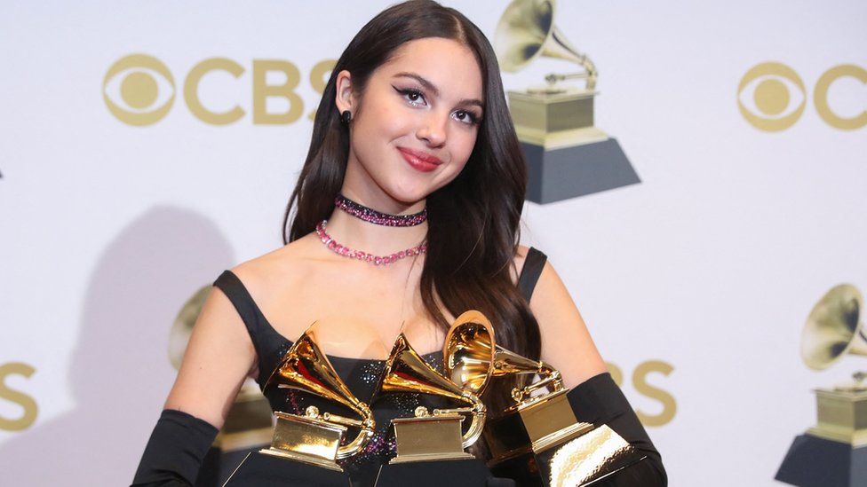Grammy honours go to Olivia Rodrigo, Silk Sonic and Jon Batiste - BBC News