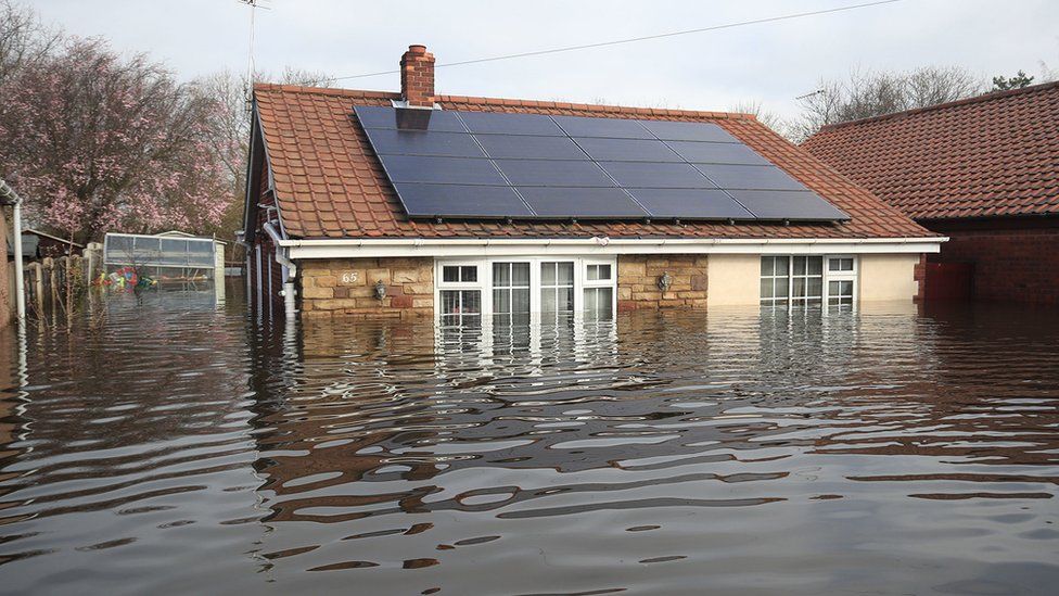 Bungalow submerged in floodwater