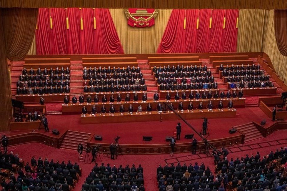 Президент Китая Си Цзиньпин, премьер Ли Кэцян и другие делегаты присутствуют на заключительном заседании Всекитайского собрания народных представителей (ВНС) в Большом зале народных собраний в Пекине, Китай, 11 марта 2021 года.