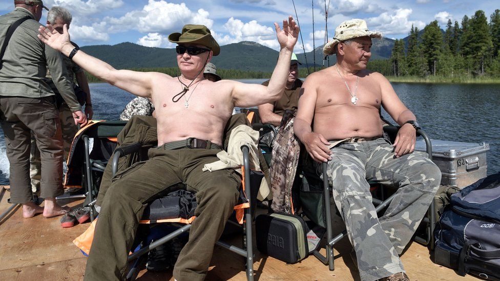 President Putin and defence minister defence minister Sergei Shoigu - both topless
