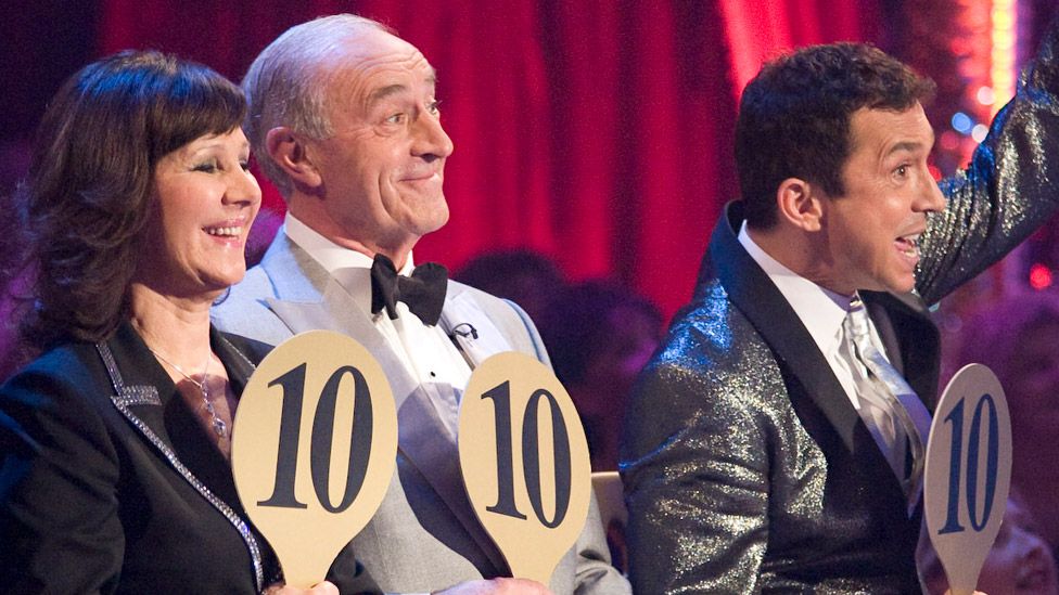 Arlene Phillips, Len Goodman and Bruno Tonioli holding up their scores on Strictly in 2008