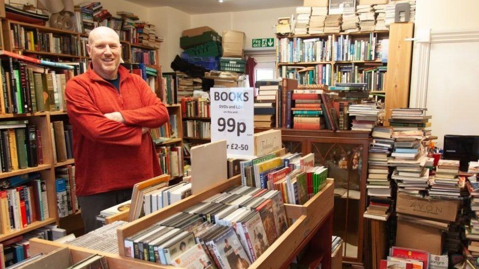 Alan Rey in his bookshop