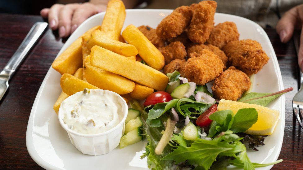 Scampi and chips with salad