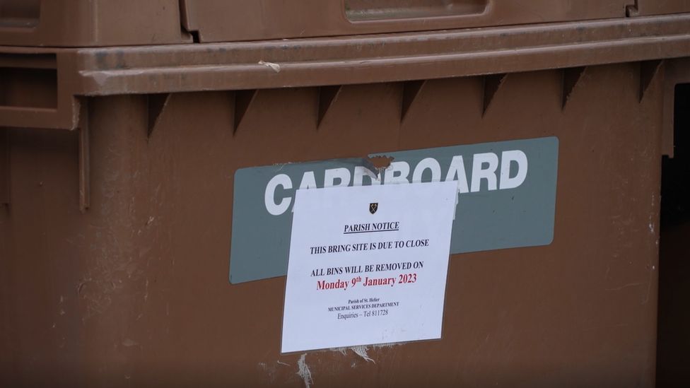Bin with sign