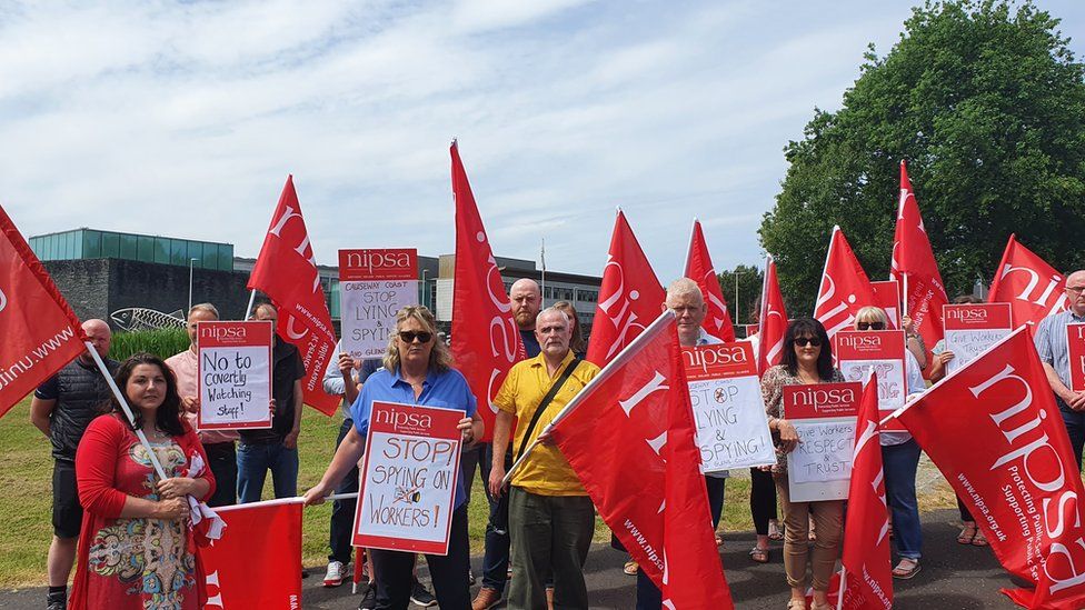 trade union members are protesting outside Causeway Coast and Glens Borough Council offices