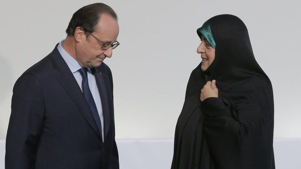 French President Francois Hollande, left greets Masoumeh Ebtekar as she arrives for the COP21, United Nations Climate Change Conference (30 November 2015)