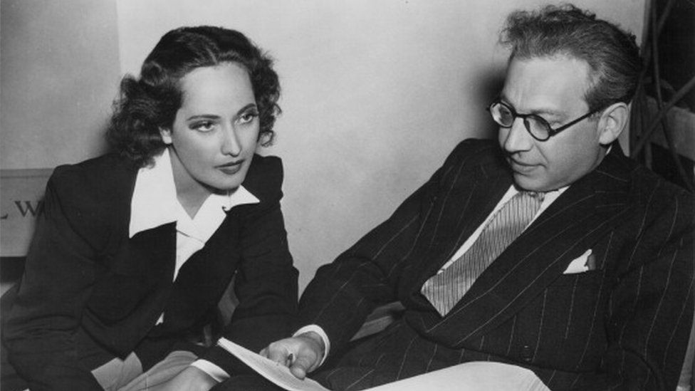 Merle Oberon with her first husband, film producer Alexander Korda, reading a script together, circa 1939-1945.