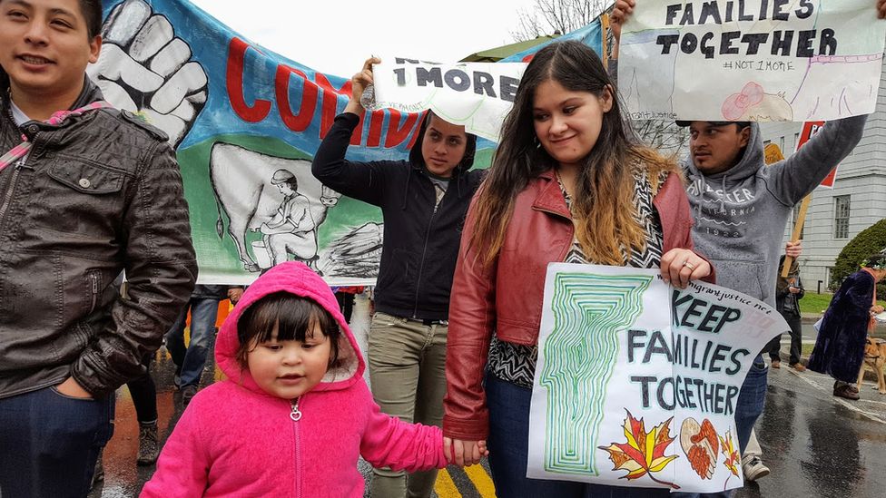 Alex Carrillo (left) with daughter and wife, leading a 2016 march to free Victor Diaz. Days later, Victor was released due to public pressure.