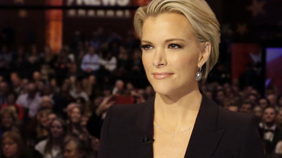 In this Jan. 28, 2016 file photo, Moderator Megyn Kelly waits for the start of the Republican presidential primary debate in Des Moines, Iowa.
