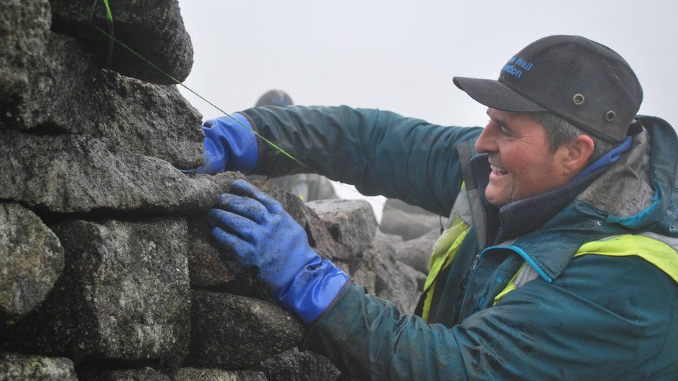 Norman McComb working on the Mourne Wall
