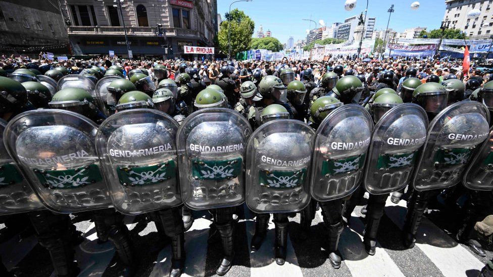 Riot police guard the Argentine congress during protests in Buenos Aires