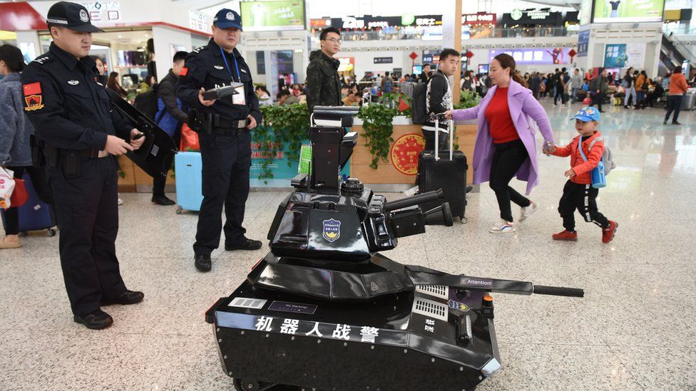 A police robot tank patrols the waiting hall on the first day of the Spring Festival travel rush at the Shenzhen North Railway Station on January 21, 2019 in Shenzhen, Guangdong Province of China.