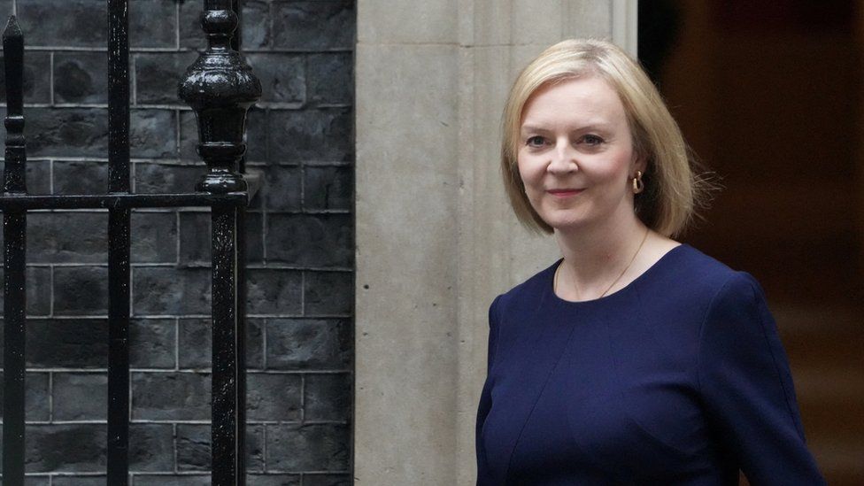 Liz Truss walks outside Downing Street in London, September 23