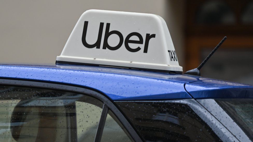 Logo of Uber seen on a car