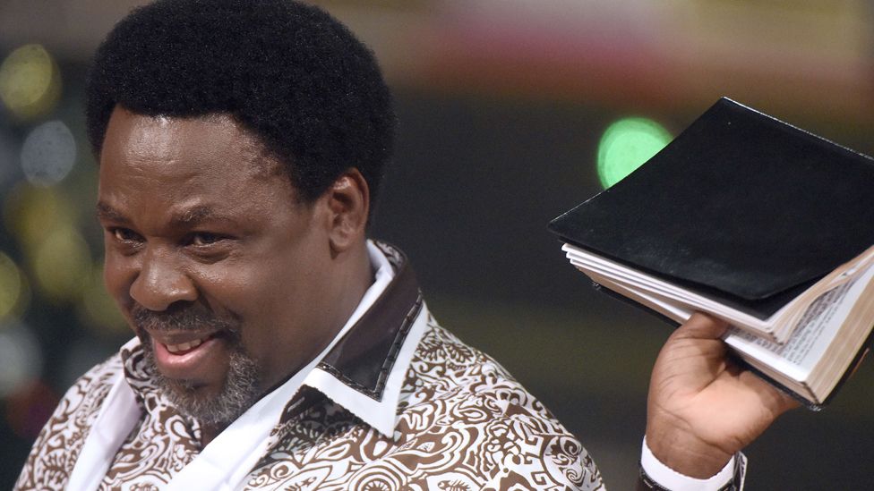 Nigerian pastor TB Joshua pictured holding a Bible on 31 December 2014