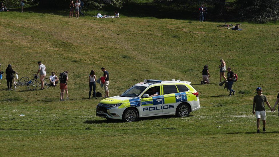 Police officers patrol Greenwich Park, London