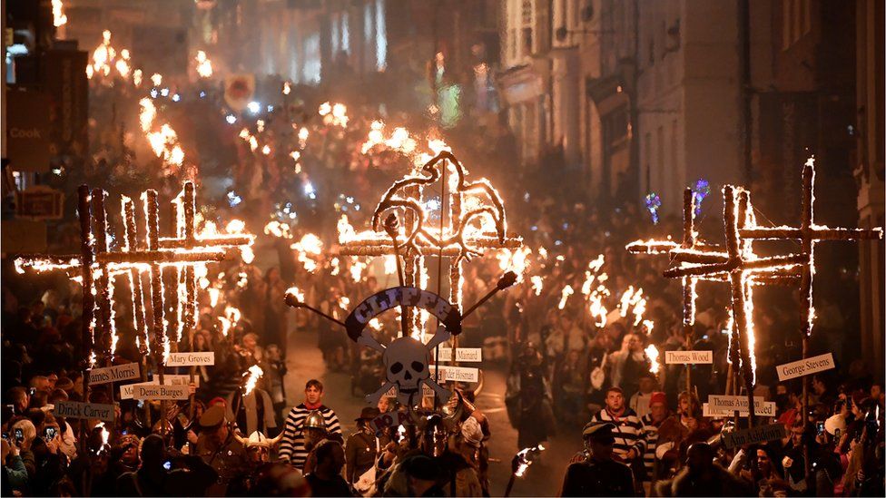 Bonfire societies parade through the streets