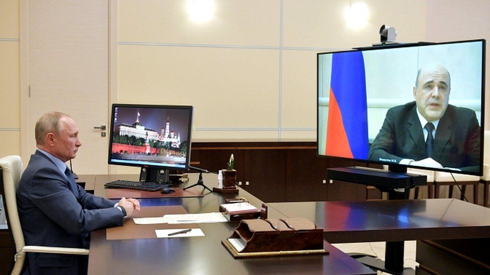 President Putin listens to Prime Minister Mikhail Mishustin during their meeting via a video link at the Novo-Ogaryovo state residence outside Moscow, Russia April 30, 2020