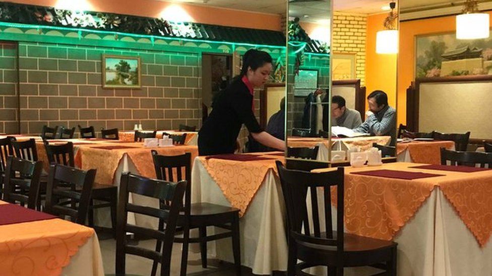 A waitress at a North Korean restaurant in Moscow