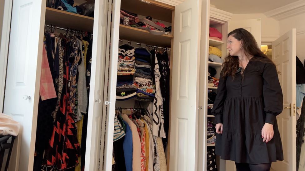 Laura Horton looks at her wardrobe