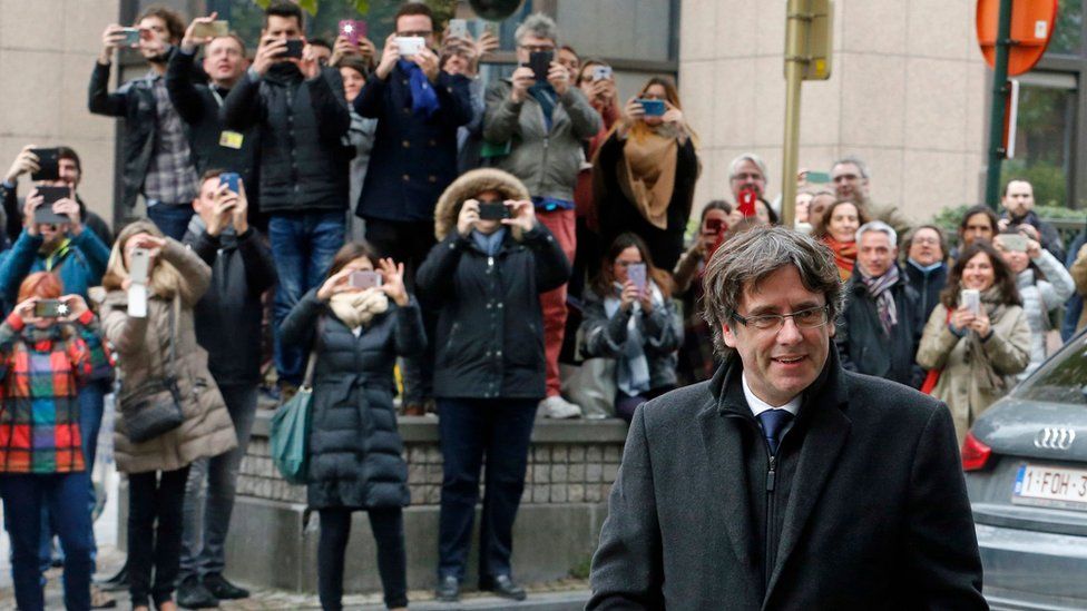 Catalonia's sacked former president Carles Puigdemont arrives to speak to journalists at the Press Club in Brussels, Belgium, on 31 October