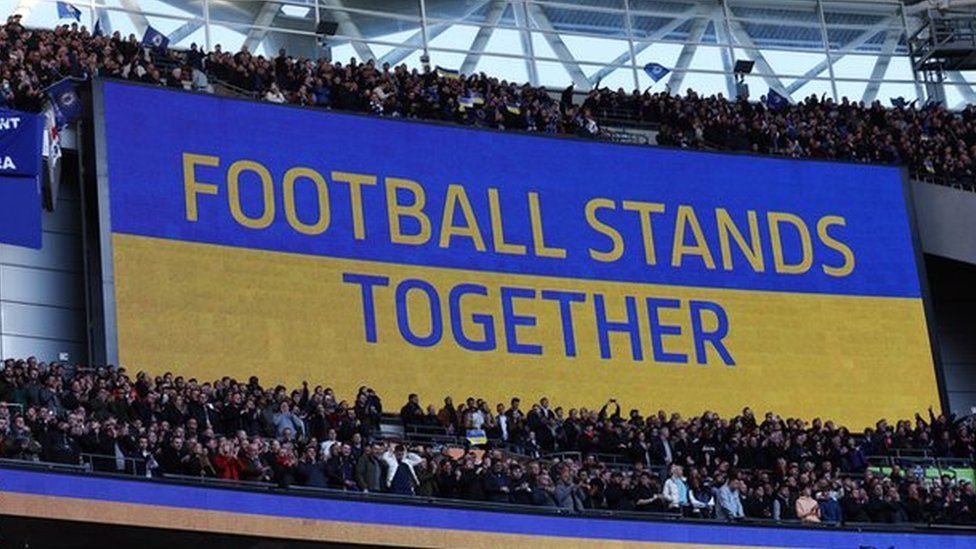 A screen saying Football Stands Together at Wembley in a show of support for Ukraine before the Carabao Cup final