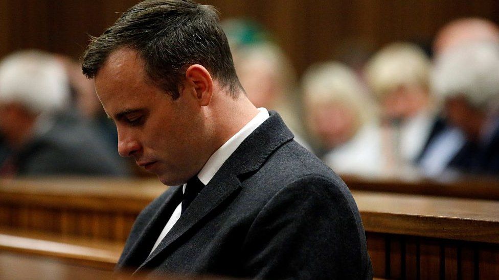 South African Paralympic athlete Oscar Pistorius sit on the chair at the North Gauteng High Court to attend summary judgement on his trial on July 6, 2016