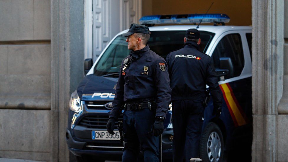 Police on guard outside the Supreme Court in Madrid, 1 December