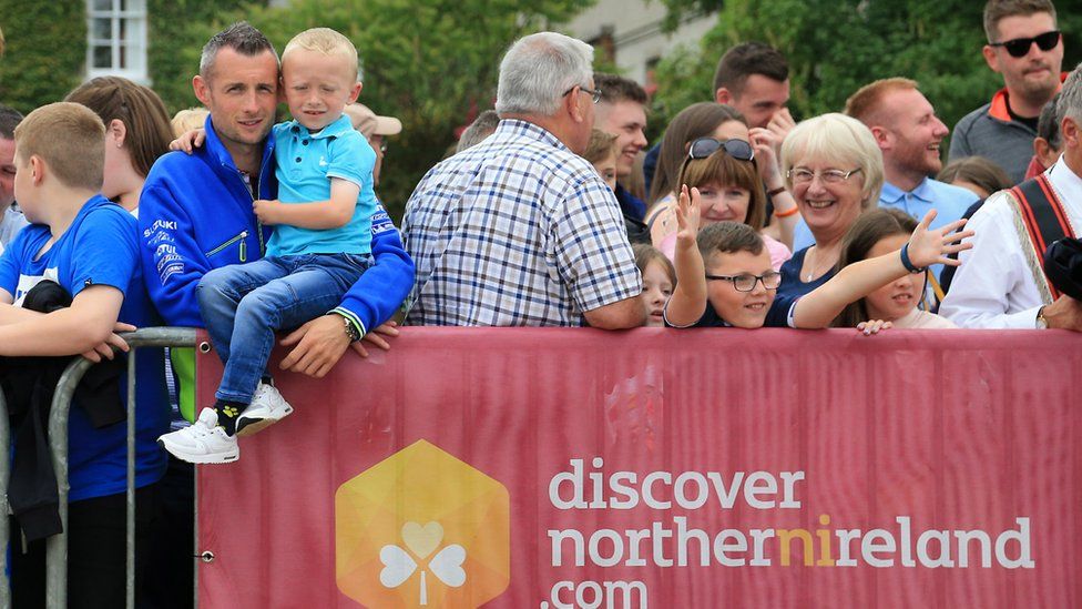 Crowds celebrating at the Scarva Sham Fight