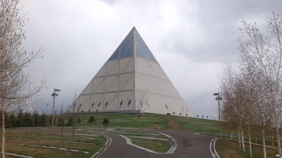 A pyramid-shaped building designed by Norman Foster stands in the Kazakh capital Astana