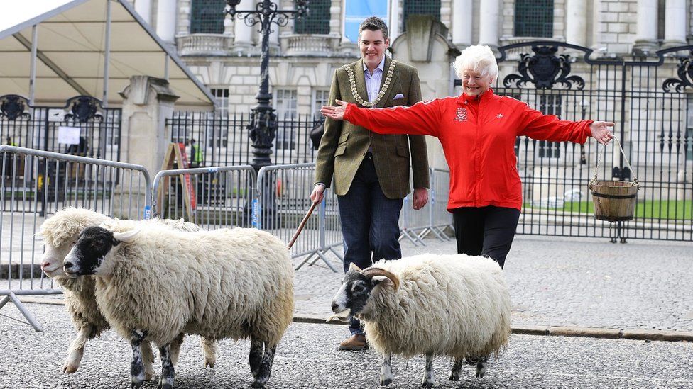 Dame Mary Peters and Lord Mayor Gavin Robinson not at all sheepish on the streets of Belfast