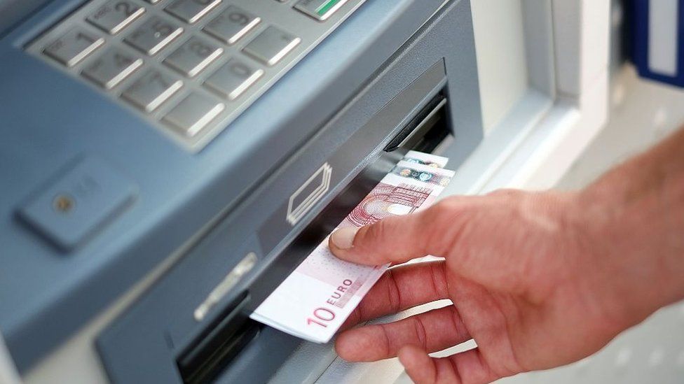 An ATM dispensing euros