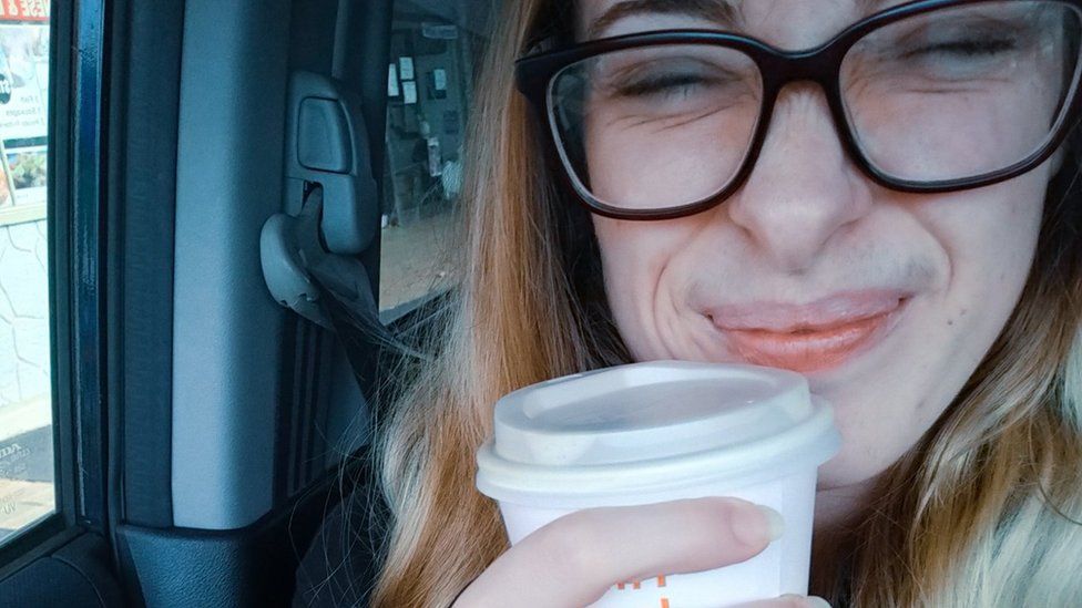 Victoria Howe with a cup of coffee
