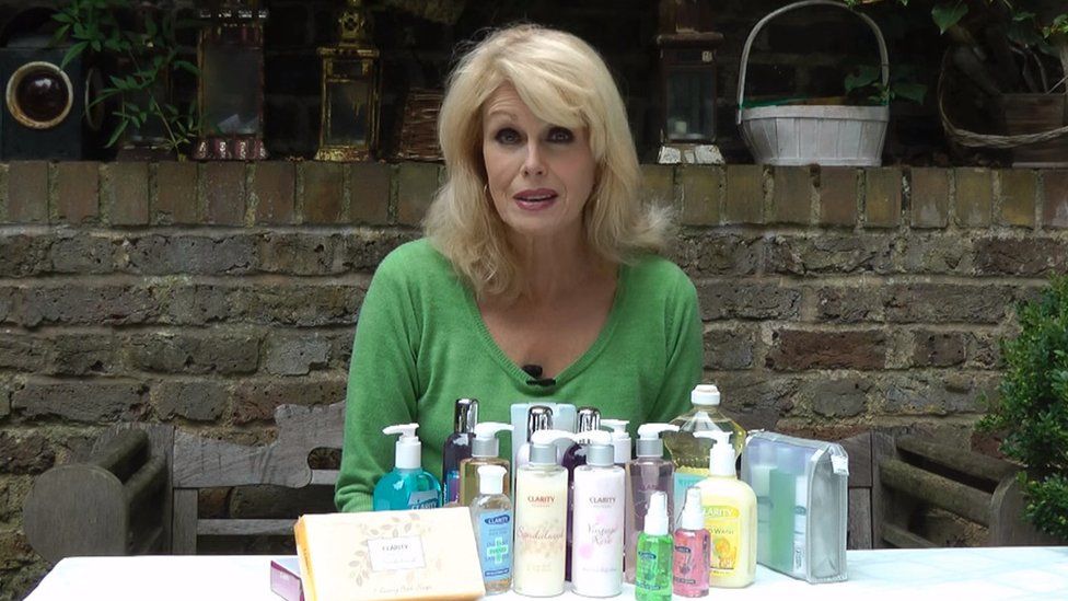 Joanna Lumley with a collection of Clarity products