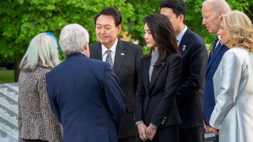 President Joe Biden (2-R) and First Lady Jill Biden (R) look on as South Korea President Yoon Suk Yeol (C-L) and First Lady Kim Keon Hee (C-R) talk with Judy Wade, niece of Medal of Honor recipient Corporal Luther Story, and her spouse Joseph Wade, during a visit to the Korean War Memorial, in Washington, DC, USA, 25 April 2023.