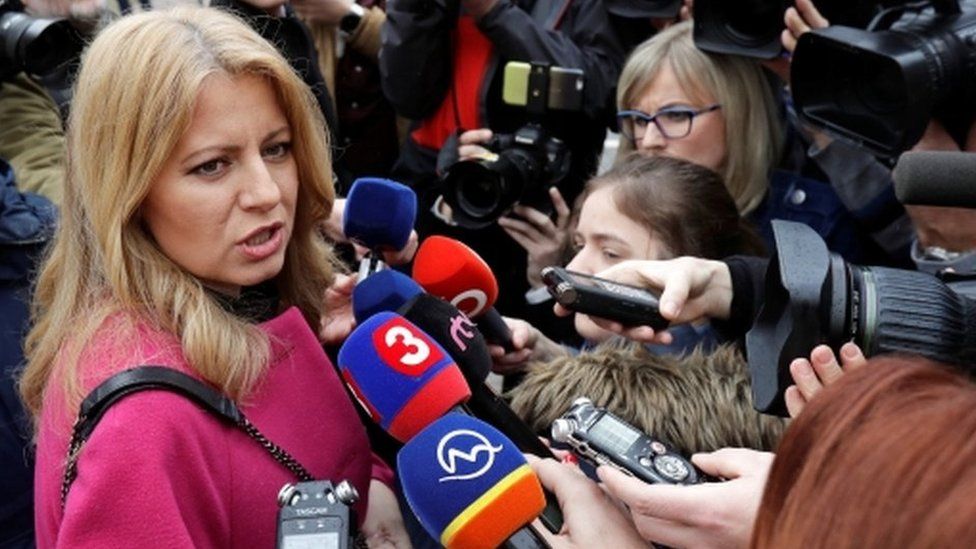 Slovakia"s presidential candidate Zuzana Caputova speaks to media as she arrives to cast her vote during the country"s presidential elections at a polling station in Pezinok, Slovakia, March 16, 2019