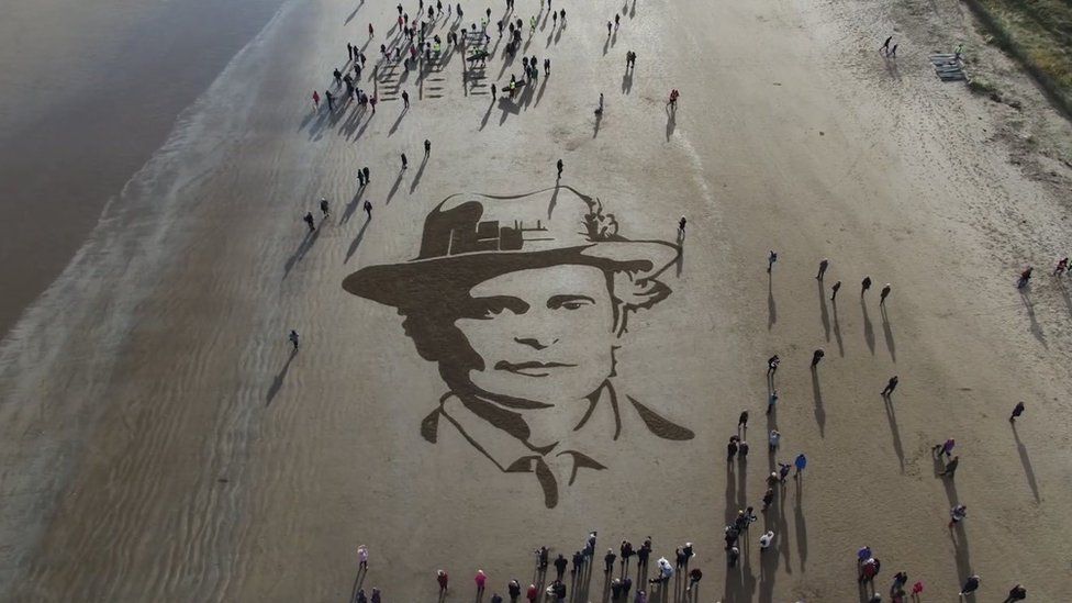 A large portrait of Dr Elsie Inglis has been raked into the sand on West Sands beach in St Andrews