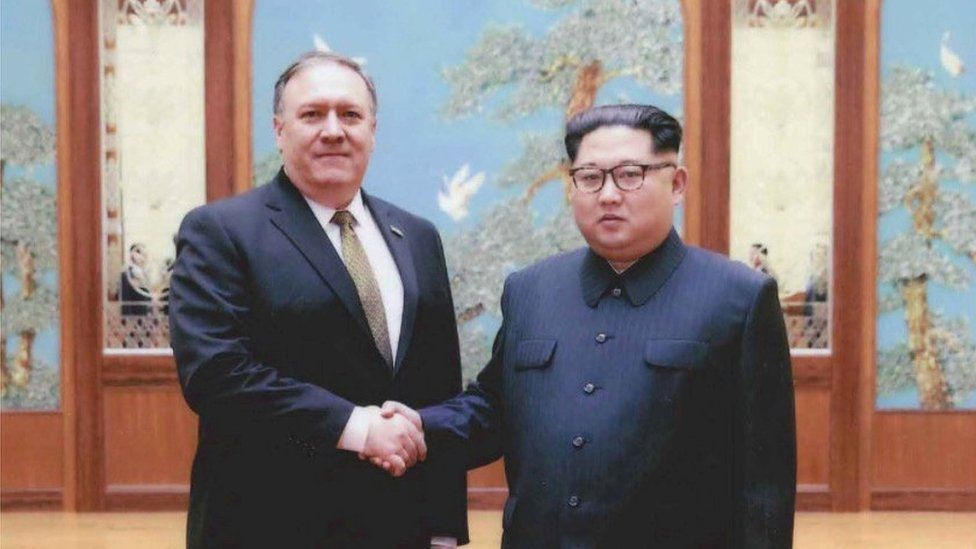 A U.S. government handout photo released by White House Press Secretary Sarah Huckabee Sanders shows U.S. Central Intelligence (CIA) Director Mike Pompeo meeting with North Korean leader Kim Jong Un in Pyongyang, North Korea in a photo that Sanders said was taken over Easter weekend 2018.