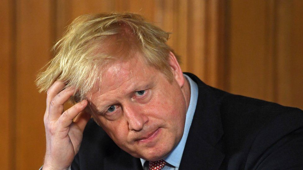 Prime Minister Boris Johnson places his manus  connected  his caput  arsenic  helium  is heavy  successful  thought   astatine  a quality    league  wrong  No 10 Downing Street, London